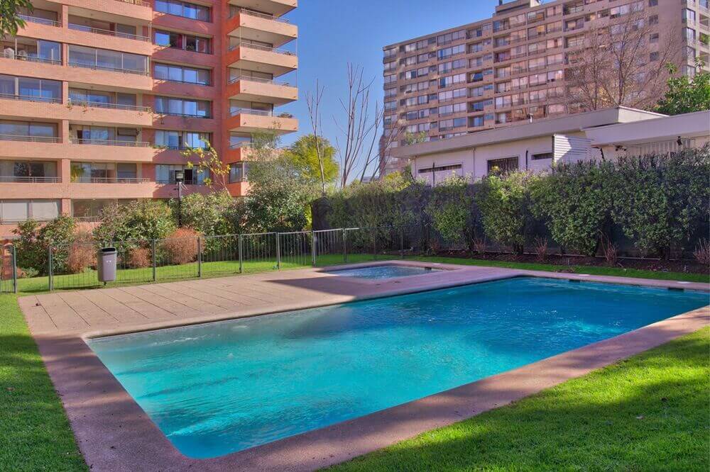 Pool of building located near Plaza del Inca in Las Condes