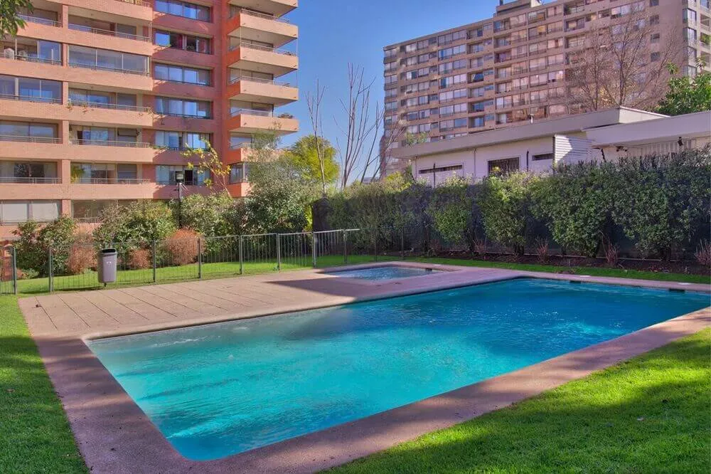 Pool of building located near Plaza del Inca in Las Condes